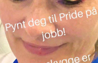 Bildet viser et ansikt med øyskygge lagt i pridefarger.