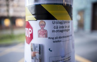 Bildet viser en plakat med informasjon om meslinger.