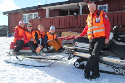 Familien Blakkestad på en scooter